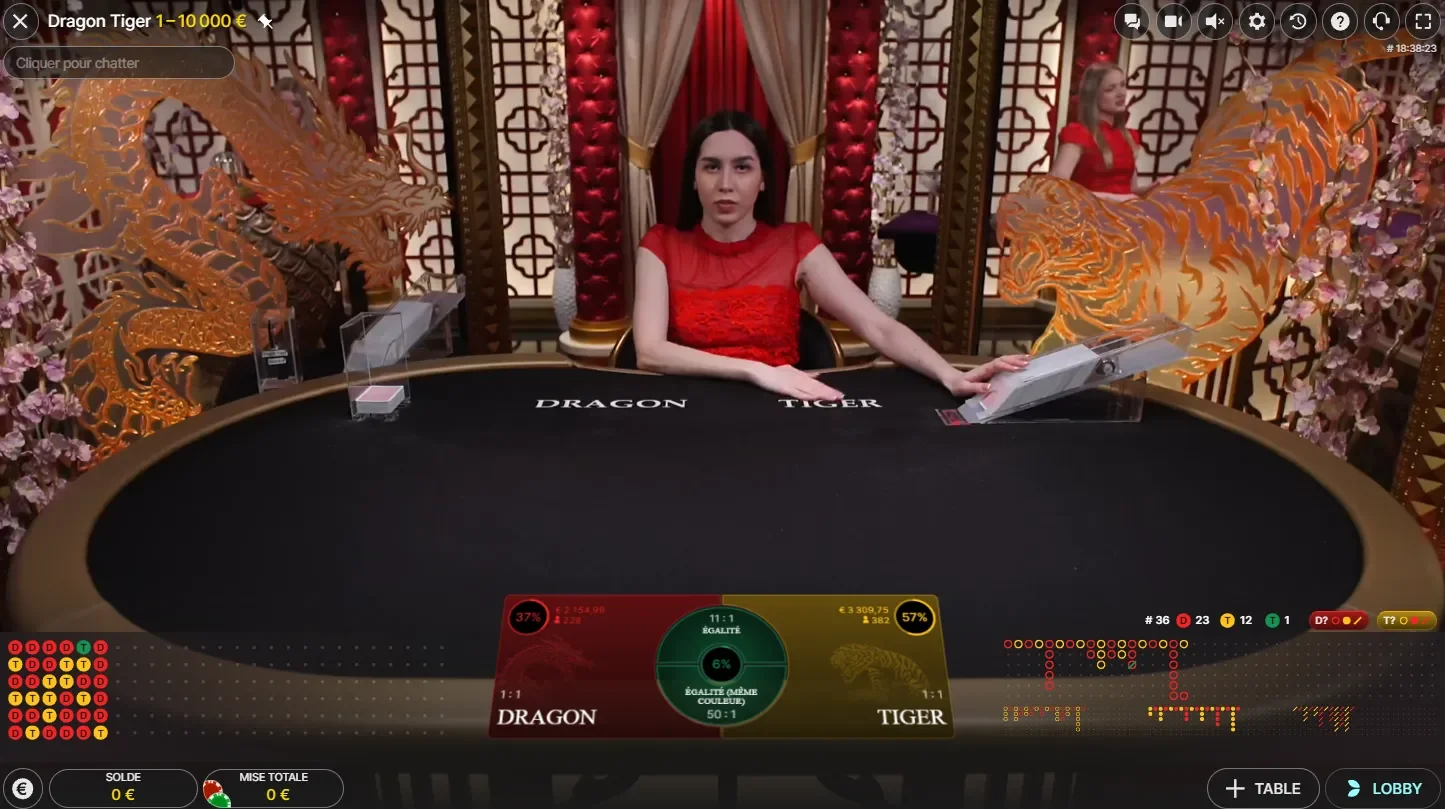 croupi&egrave;re pr&ecirc;te &agrave; distribu&eacute;e les cartes au dragon tiger baccarat